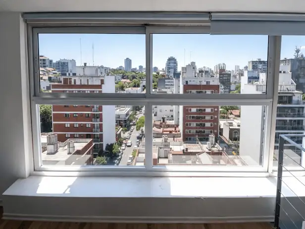 Obra cerramiento balcón